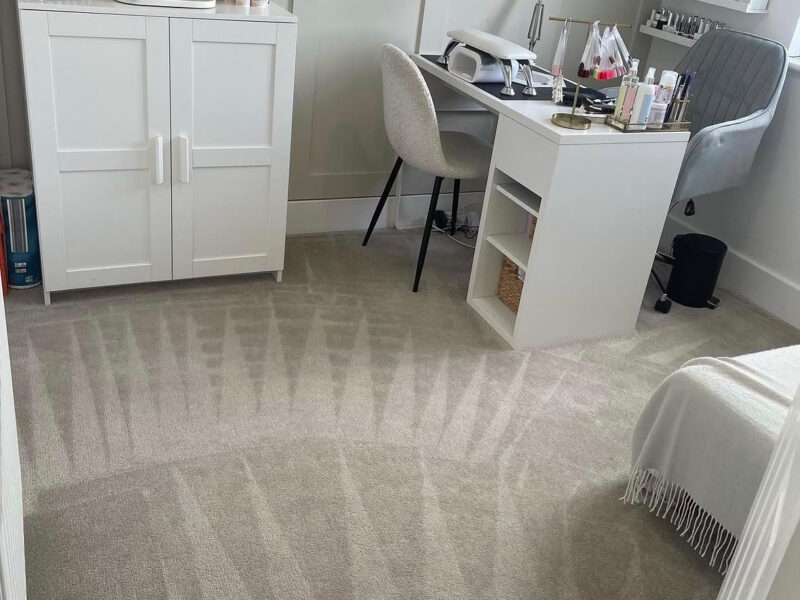 Bright, clean living room rug after carpet restoration